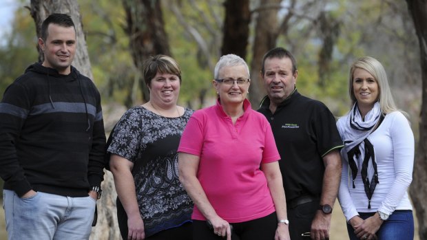 Multiple sclerosis sufferer, Anne Hill (centre) with family members near her home. From left, son Simon Hill, daughter Kristen Hill, husband David Hill and daughter Laura Elphick.