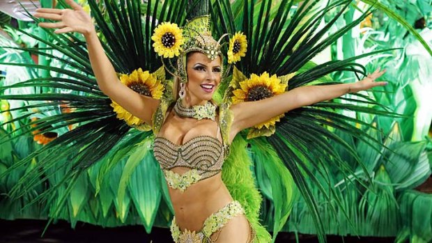 With its 3800 dancers and seven giant fantasy floats, Vila Isabel was the last of 12 elite samba schools to dazzle a capacity crowd early Tuesday at the 72,000-seat Sambodrome