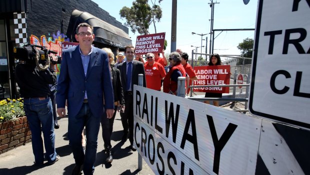 Opposition Leader Daniel Andrews campaigning at the McKinnon railway crossing.