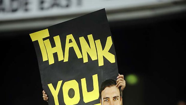 Giving thanks: The Tigers' faithful show their feelings to a favourite son.