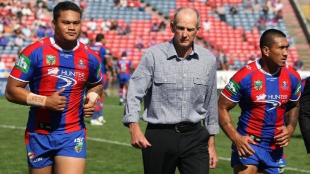 Duty: Wayne Bennett (centre) says the Knights owed it to Alex McKinnon to question the McLean ruling.