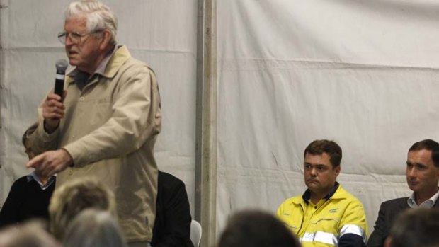 Residents ask questions of Orica management over a chemical leak last week.