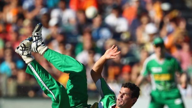 Melbourne Stars' Clint McKay hits the turf as the Stars went out.