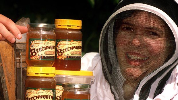 Beechworth Honey owner Jodie Goldsworthy with some of her produce.