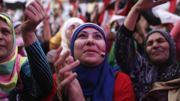 Egyptian women celebrate after the swearing-in ceremony of President Abdel Fattah al-Sissi, in front of the Presidential Palace in Cairo.