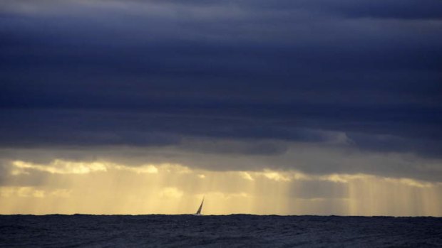 A lonely boat braves rough seas off Sydney's coast.