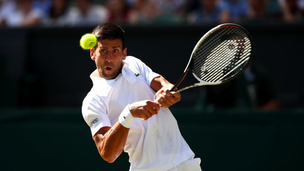 Serbian Novak Djokovic squeezes in a backhand during his third-round match against Ernests Gulbis of Latvia.