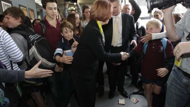 A salami sandwich at the feet of Prime Minister Julia Gillard during her visit to Lyneham High School.