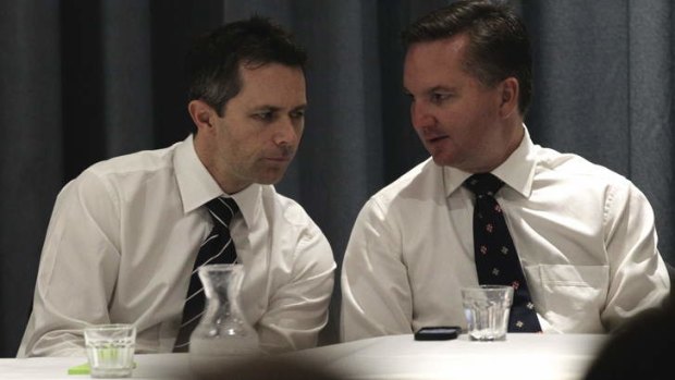 Federal MPs Jason Clare and Chris Bowen at a community gun forum in western Sydney.