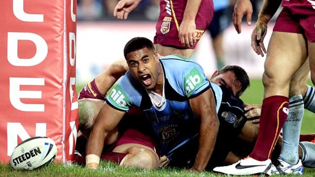 Great try: Michael Jennings celebrates after scoring late in the first half.