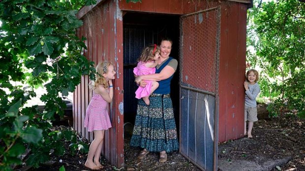 School's in: Annie Regan home schools her children Caitlin, 9, Liam, 7, and Millie, 4, at their Tarrawarra  home.