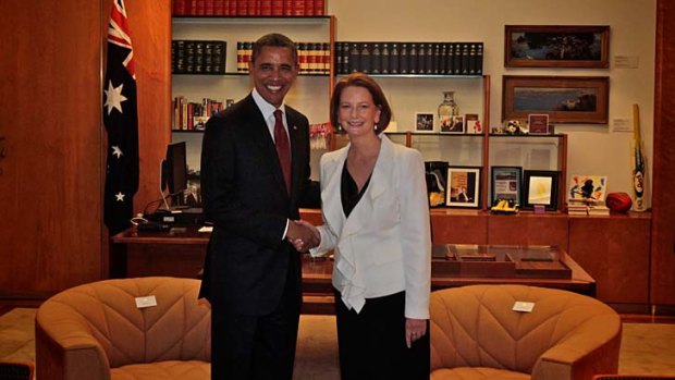 Then Australian prime minister Julia Gillard greets US President Barack Obama during a visit to Canberra in 2011.