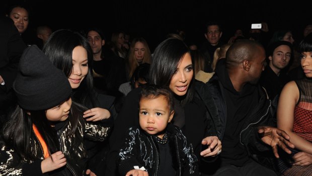 Officially cute: North West with mother Kim Kardashian and father Kanye West at New York Fashion Week.