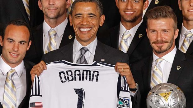 Now that's fame: Beckham with US President Barack Obama.