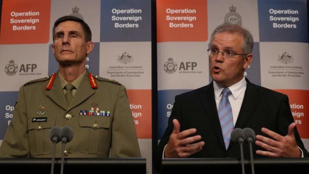 Staying tight lipped over the incursions: Lieutenant-General Angus Campbell, left, and the Immigration Minister Scott Morrison.