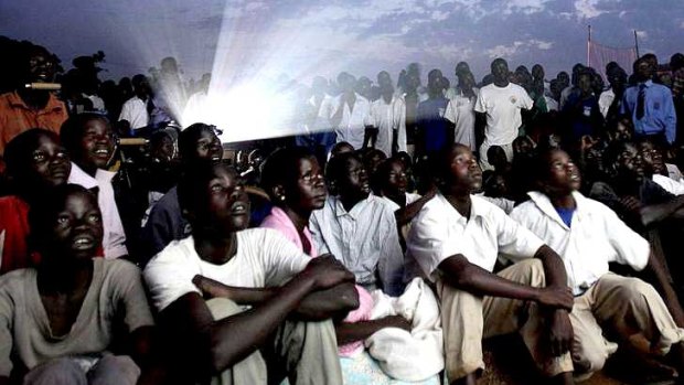 Locals watch Invisible Children's <i>Kony 2012 </i> in Lira, a district in northern Uganda ravaged for 20 years by Joseph Kony's Lords Resistance Army rebels.