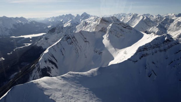 Birds-eye view of the Canadian Rockies from a helicopter.