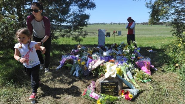 Visitors pay tribute to Jill Meagher at a memorial site where her body was found in Gisborne South.
