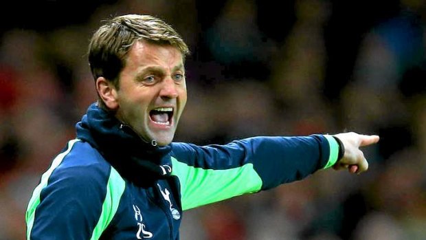 Outpointed: Tim Sherwood, the new Tottenham manager, came up against a master tactician in Arsenal's Arsene Wenger in the FA Cup and came off second best.