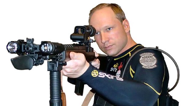 Anders Behring Breivik aiming an assault rifle.