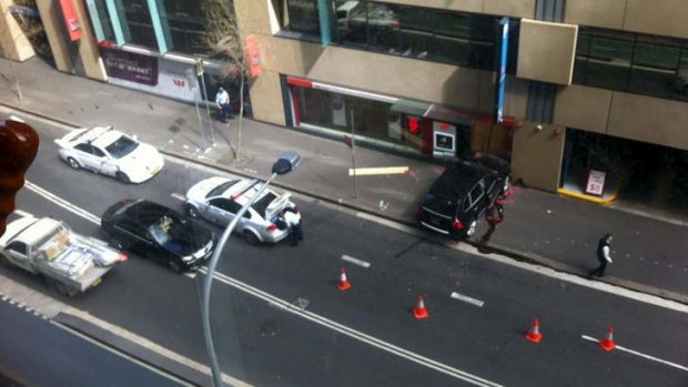 Ram raid: the scene where two men raided a Westpac bank.