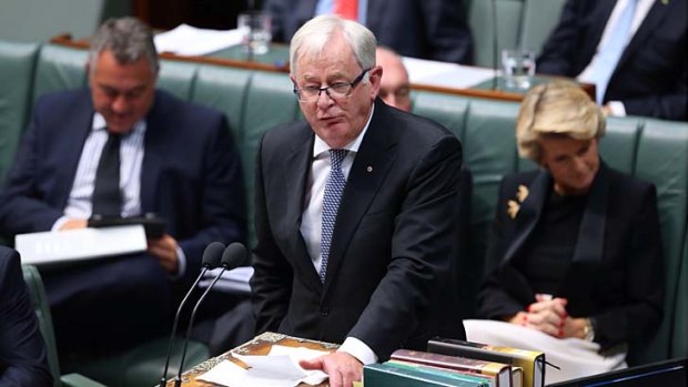 Prime Minister Tony Abbott has announced Trade minister Andrew Robb, pictured during question time on Monday, has cancelled a planned trade visit to Russia.