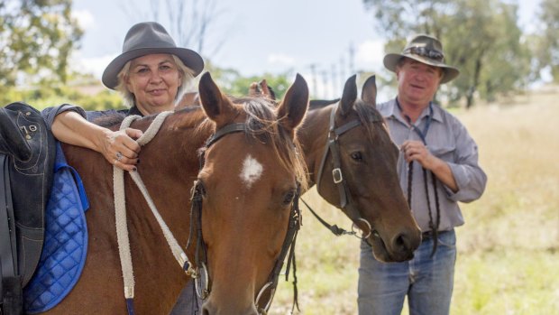 Robert Brice and his partner Judi Lopez, with horses Charlie and Precision, at Kambah.