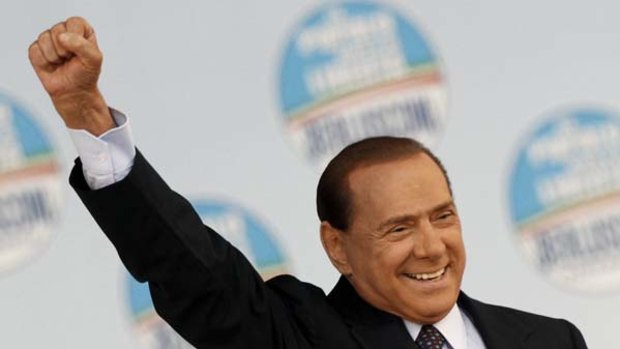 Go with the money ... Italy's Prime Minister Silvio Berlusconi.