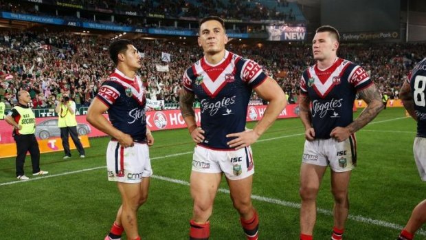 End of the road: Sonny Bill Williams and Roosters teammates come to terms with their loss to the Rabbitohs on Friday night.