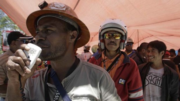Not enough ... workers at the Freeport mine in Indonesia's Papua province strike in support of their demand for a pay increase.