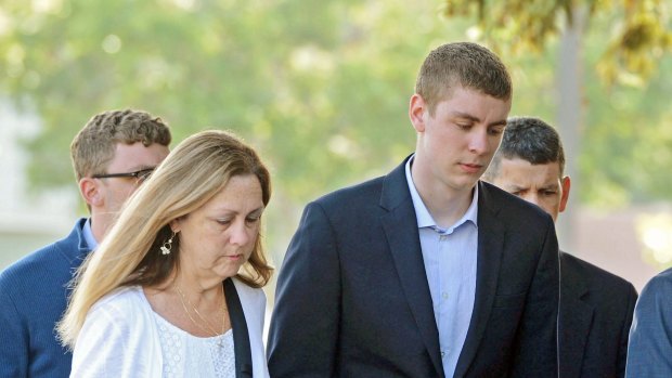 Brock Turner, right, makes his way into the Santa Clara Superior Courthouse in Palo Alto, California in 2016.