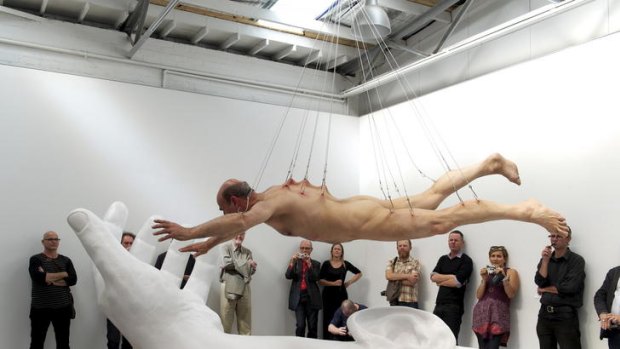 Suspended animation: Stelarc during his gallery performance in Armadale.