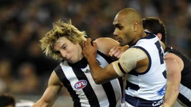 Dale Thomas and Travis Varcoe  collide during the game at the MCG.