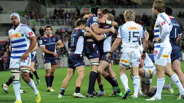 Pyling it on: The Rebels celebrate Hugh Pyle's try.