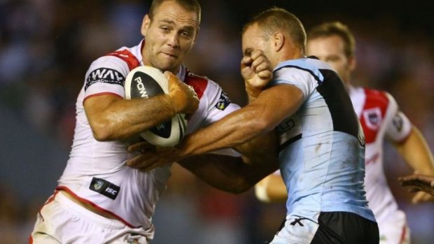 Hands off: Jason Nightingale is closed down by Daniel Holdsworth.