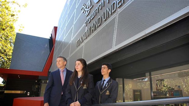 The King David school council president Michael Lawrence and school captains Liana Kiriati and Darren Levy outside their Building the Education Revolution (BER)  funded  hall , which has finally opened despite numerous setbacks.