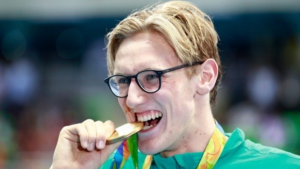 In the hot seat: Mack Horton celebrates his gold medal in the 400m