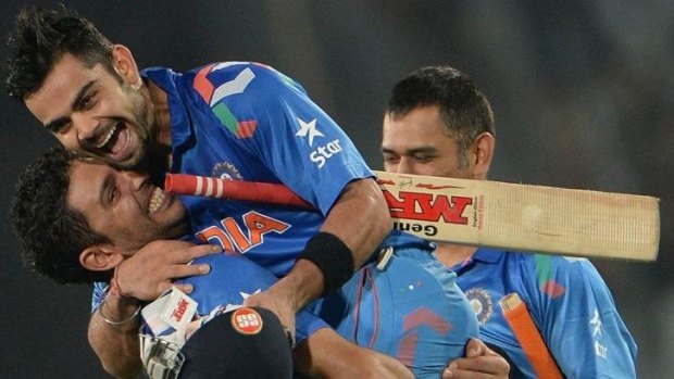 Yuvraj Singh congratulates Virat Kohli after India's six wicket win over South Africa.