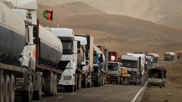 Convoy ... trucks protected by Matiullah Khan's men at Wach Bakhto, on the Tarin Kowt to Kandahar Highway.