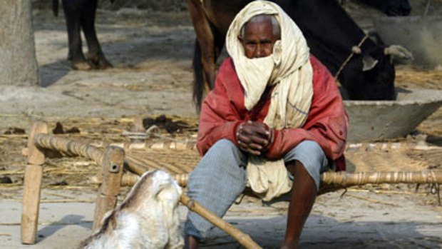 A Dalit ("untouchable") man sits on the outskirts of the city of Lucknow.