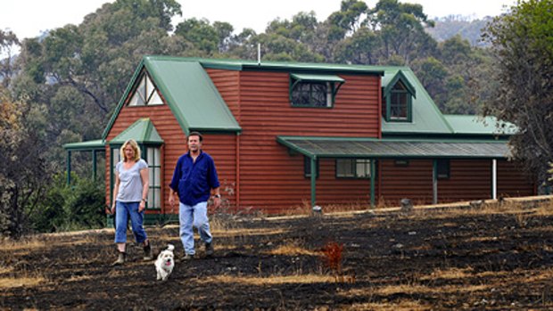 Still standing: While neighbours' Boolarra homes were destroyed, Andrew and Kerryn Taylor's place was spared.