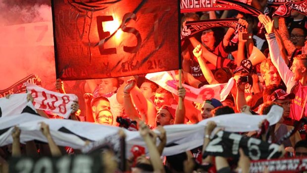 Block party &#8230; Wanderers fans light up the stadium.