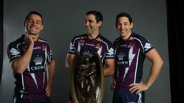 Three prize men ... Cooper Cronk, Cameron Smith and Billy Slater at yesterday's grand final breakfast.