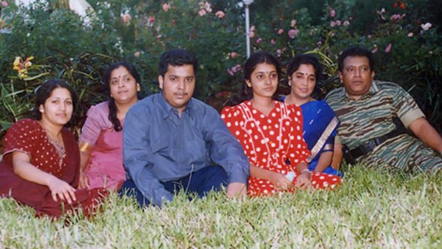 A photo  of Tamil Tiger leader Velupillai Prabhakaran (right) with his wife, daughters and son.