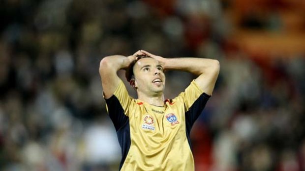 Show us the money ... Newcastle Jets players, such as  Marko Jesic, haven't been paid.