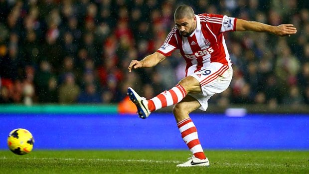 Stoke's Jonathan Walters scores his side's third goal.