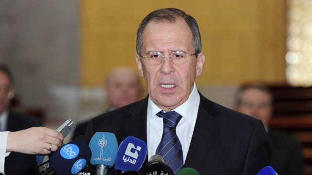 Upbeat ... Sergei Lavrov after his meeting with Assad.