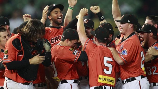 Australia's Canberra Cavalry players celebrate after defeating Taiwan's Uni-President 7-Eleven Lions 14-4 during their Asia Series 2013 baseball game final.