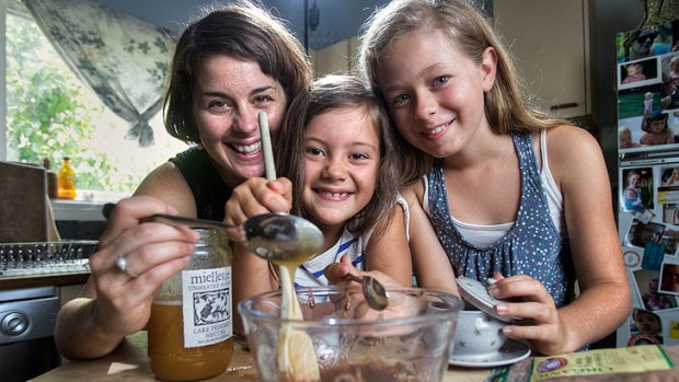 Westgarth naturopath Ali Gould cooks with her daughters Anaya, 7 (centre), and Christa, 11, to encourage a healthy attitude towards food, but says vitamin supplements can sometimes be necessary.