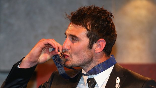 Jobe Watson with his Brownlow Medal the night he won it in September 2012.
